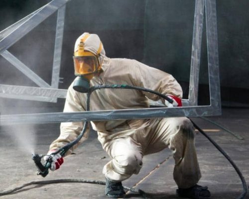 Application de peinture industrielle par Çadécaptout sur surface métallique à Mézidon Vallée d’Auge